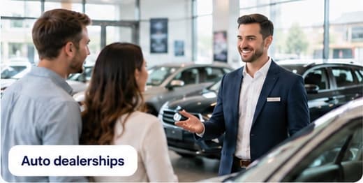 Auto dealership representative helping customers